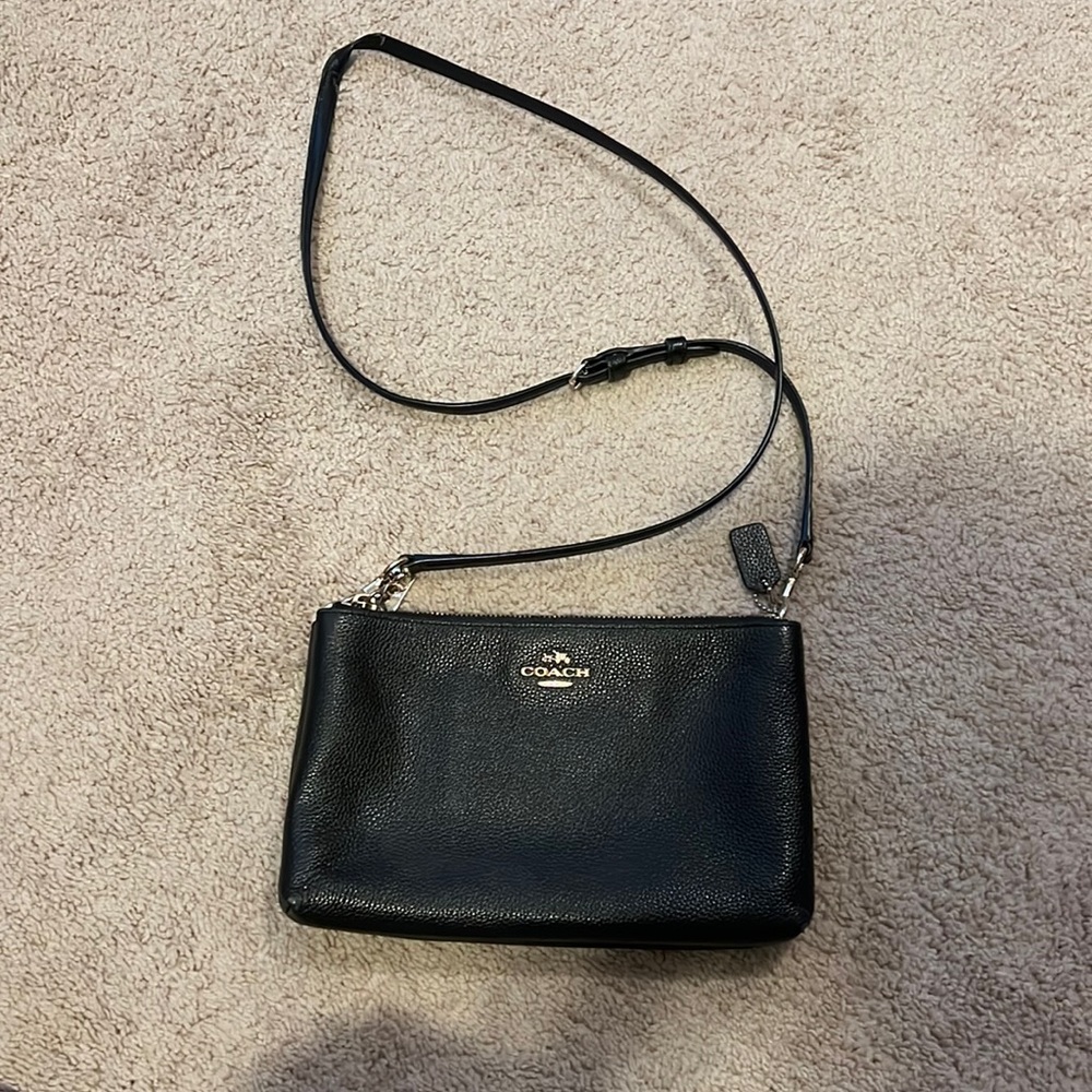 Black cross body coach bag gently used